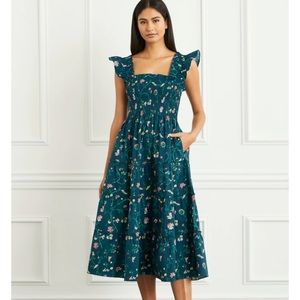 “The Ellie Nap dress” Hill house, the color is a burgundy and pink.